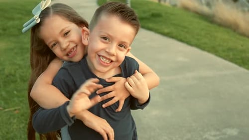 children siblings friends cousins happy enjoying their friendship playing laughing in the park
