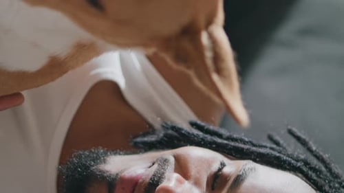 Man Receives Loving Licks from His Dog