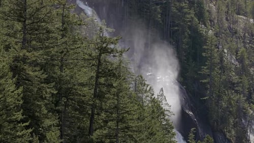 Waterfall Running Down the Mountain in Canadian Nature Landscape Aerial Cinematic Pan