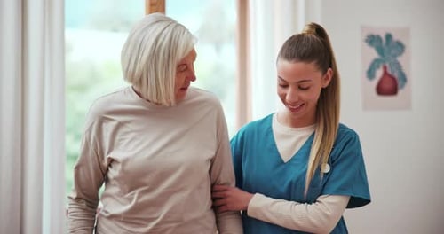 Physiotherapist, patient and assistance with walking in hospital for recovery