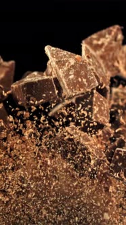 Chunks of Chocolate Fly Up and Fall Down Filmed on a Highspeed Camera at 1000 Fps