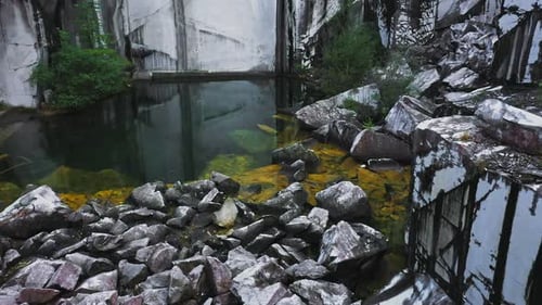 Aerial Shot of Tilting Up in Abandoned White Marble Quarry in Carrara Italy
