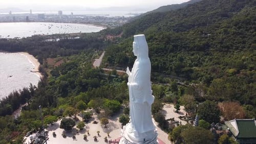 Aerial View of Beach with Statue Landmark