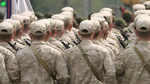 Rows of Soldiers Marching in Uniform