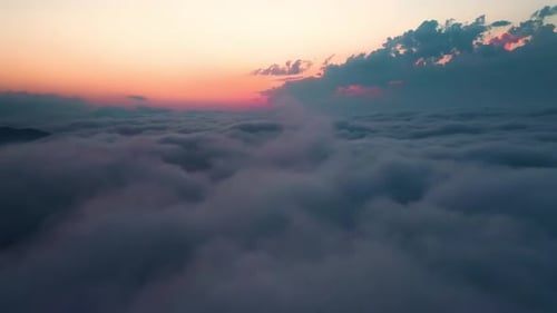 Aerial View of Clouds at Dreamy Sunrise