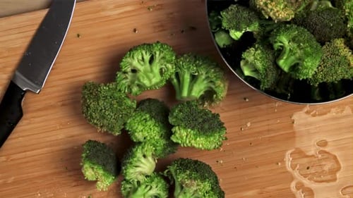 Broccoli Falls on the Board Filmed is Slow Motion 1000 Fps