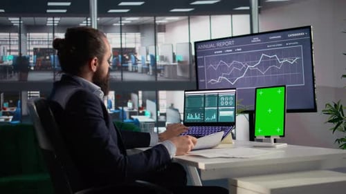 Vertical Green Screen on Tablet with Male Professional Analyzing Company Data