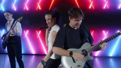 Energetic Music Band Performing Live on Stage