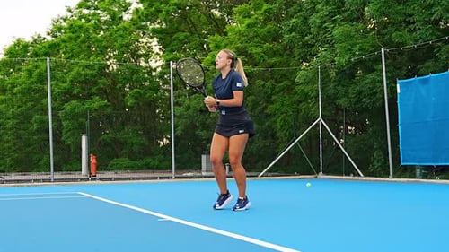 Professional Female Tennis Player Playing the Tennis on Outside Court