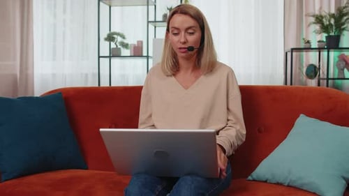 Young Woman Freelance Worker Call Support Center Service Operator Helpline Having Talk with Client