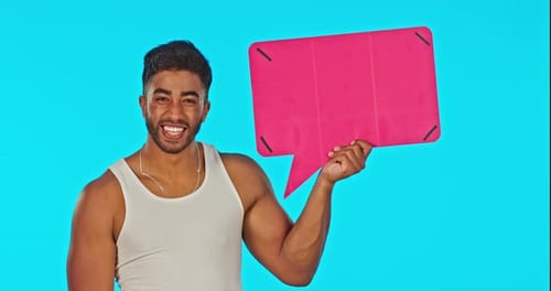 Pointing, speech bubble and face of a man in a studio with mockup space for advertising