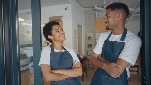 employees working in a nordic styled cafe.