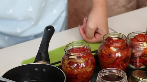 Woman Preparing Tomato Confit