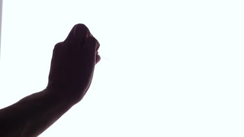 Balloon with Dollar Sign Popped by Needle