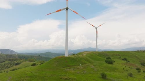 Wind Turbines on Top of Green Hill