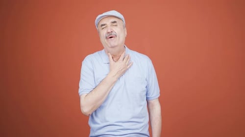 Old man with sore throat.