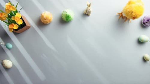 Easter Decorations and Shadows Overhead Flat Lay