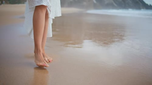 Woman Legs Leaving Footprints at Ocean Shore Closeup Carefree Girl Walking Sand