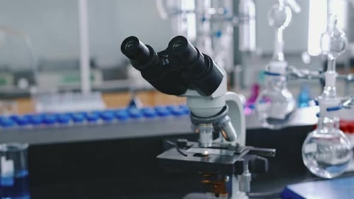 Microscope in a Science Laboratory with Other Equipment