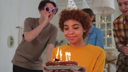 Friends Celebrate Birthday with Cake and Cheer