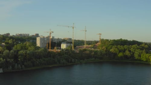 Tower Cranes at Construction Site of Apartment Complex