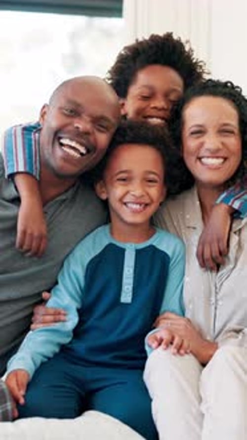 Happy Family Portrait Indoors in Pajamas