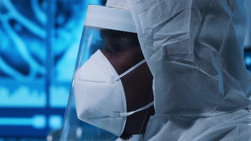 Scientist holds test tube with blood sample in lab