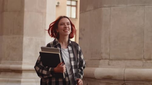Smiling Young Adult Student on University Campus