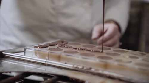 Chocolate being poured into mold