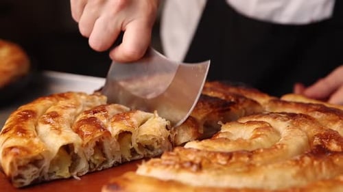 Delicious burek in a Balkan café. A typical Balkan dish. Close-up