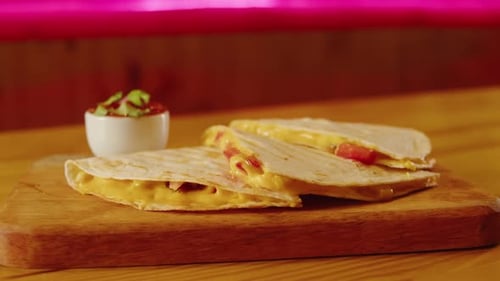 Close Up of Cheese Quesadilla Eating Traditional Mexican Food Tex Mex Cuisine