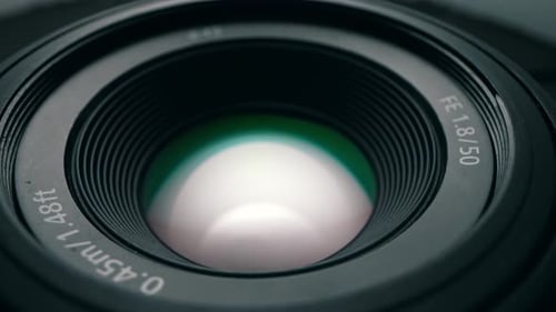 Extreme Close-Up of Camera Lens with Metallic Details
