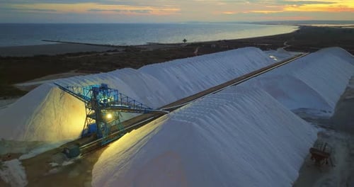 View of a Salt Flat Factory Besides the Sea Raw Materials in Large Volumes are Ready for Export