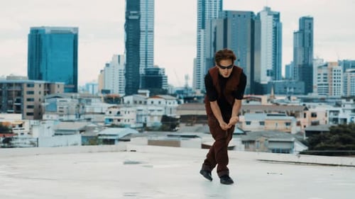 B-boy dance performance by professional street dancer at rooftop. hiphop.