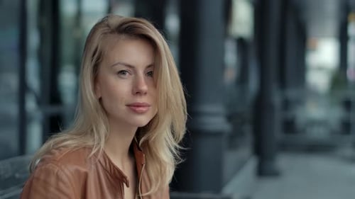 Young 30s Modern Attractive Woman Portrait Looking at City Street Outdoors