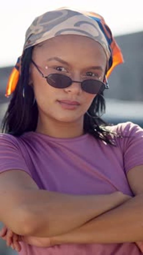Stylish Woman with Sunglasses Posing Outdoors