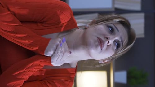 Woman Holding Neck in Pain, Close Up