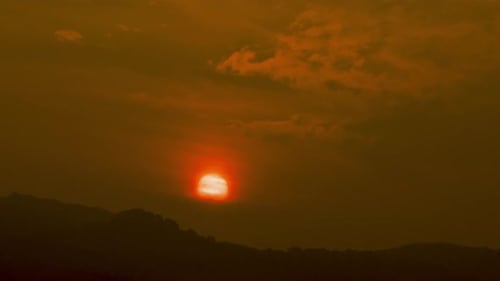 Golden Sunrise Over Mountain Range, Dramatic Sky