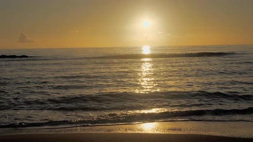 Beautiful View Sunset Over Sea Ocean Waves Crashing on Beach