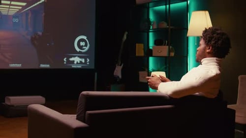 Man Playing Singleplayer Videogames on Ultrawide Smart TV