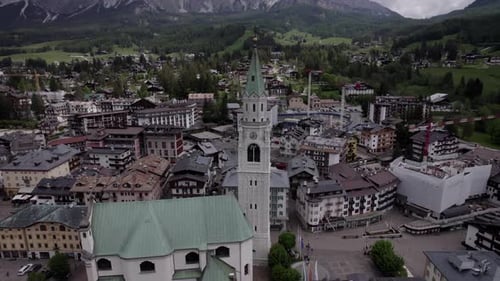 Close orbit medieval clock tower Cortina D'Ampezzo, Dolomites Italy