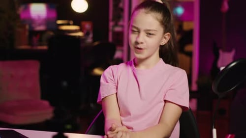 Charming Young Girl Shooting Video for Social Media Platform in Living Room