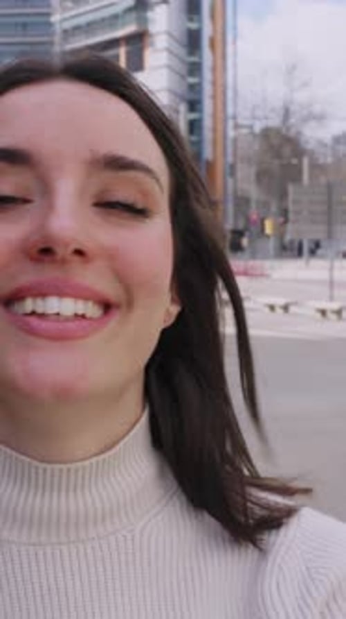 Portrait of Young Happy Attractive Woman Smiling at Camera Standing at City