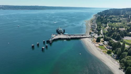 Orbiting wide view of the Clinton Ferry terminal on Whidbey Island.