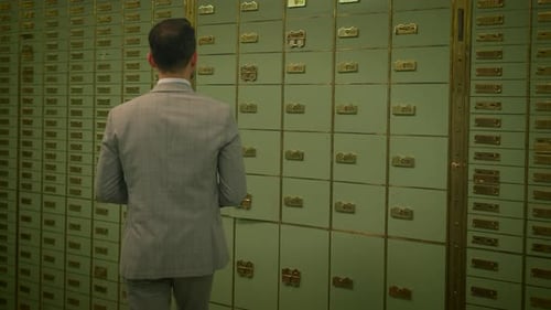 Businessman Entering Bank Safe Vault Room Storing Silver Bullion Inside Deposit