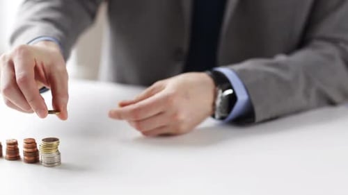 Business, People, Finances, Money Saving and Economy Concept - Close Up Of