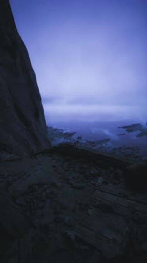 Serene Twilight Overlooking the Ocean at Rocky Cliffs By the Shore