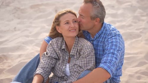 Romantic Middleaged Couple Enjoying a Peaceful Evening Together on the Beach Love Connection and
