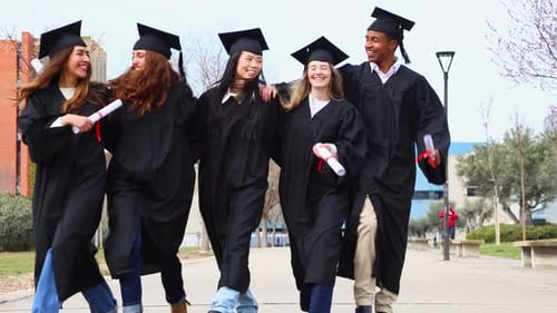 Diverse Graduates Celebrate University Diploma Achievement Together