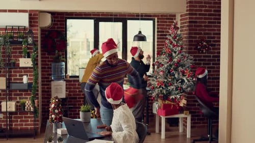 Startup Colleagues Giving Presents on Christmas Eve Day